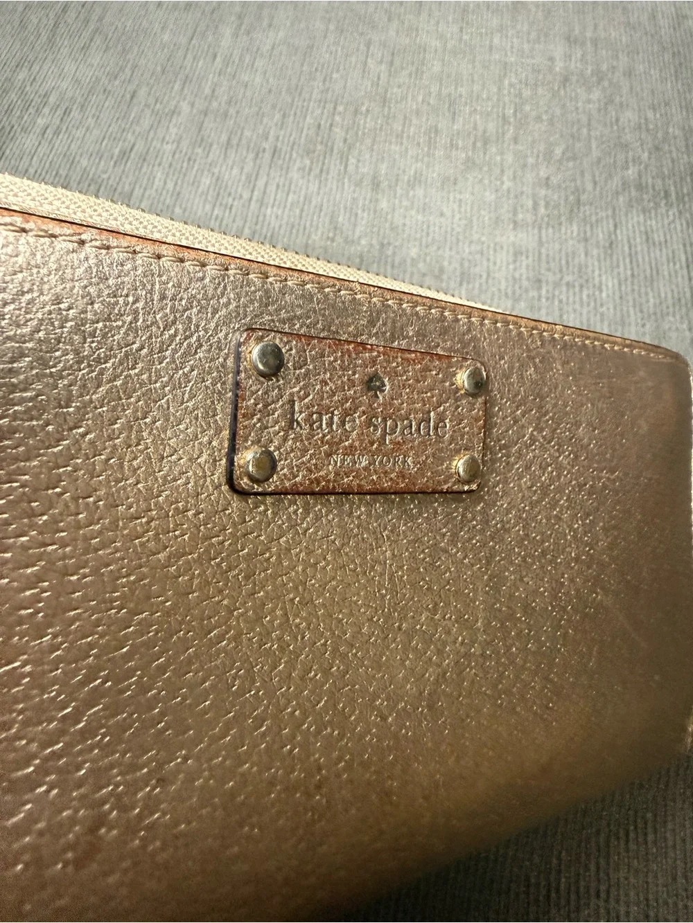 Kate spade Metallic Rose Gold Wristlet Wallet with Zip Closure